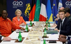 Senegalese President Macky Sall, the current chair of the African Union, takes part in a Group of 20 meeting in Bali, Indonesia in November 2022 with French President Emmanuel Macron and European Commission President Ursula von der Leyen 