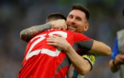 Emiliano Martinez celebrated with Lionel Messi