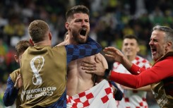 'Fight, work hard': Croatia forward Bruno Petkovic celebrates scoring against Brazil in the quarter-final