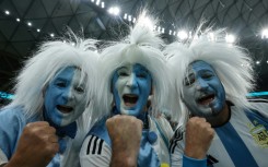 Argentina supporters cheer before the start of the Qatar 2022 World Cup football semi-final match between Argentina and Croatia 