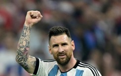 Argentina's forward #10 Lionel Messi celebrates scoring his team's first goal from the penalty spot during the Qatar 2022 World Cup football semi-final match between Argentina and Croatia in Lusail, north of Doha; Messi even has fans in Brazil 