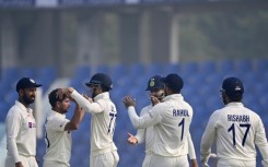 India celebrate after the dismissal of Bangladesh's Ebadot Hossain