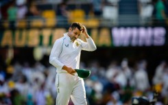 South Africa's captain Dean Elgar leaves the field at the conclusion of the first Test 