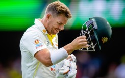 Australia's David Warner walks off after being dismissed by South Africa's Kagiso Rabada during the first Test 