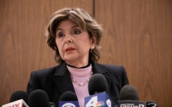 Gloria Allred, the well-known women's rights attorney, speaks to reporters after disgraced movie mogul Harvey Weinstein is found guilty of three counts of sexual assault in Los Angeles