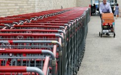 Consumer spending drove the upward revision in US GDP in the third quarter, the Commerce Department says