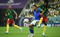 Injured - Arsenal and Brazil forward Gabriel Jesus (C) in action against Cameroon at the World Cup