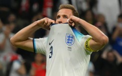 Harry Kane reacts after missing from the spot during England's World Cup quarter-final defeat against France