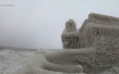 A snowplow clears a road on December 23, 2022, in London, Ontario in Canada during the severe winter storm that battered North America ahead of Christmas day 