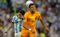 Cody Gakpo (right) is set to join Liverpool from PSV Eindhoven