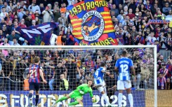 Espanyol's Spanish striker Joselu nets in the derby clash with Barcelona