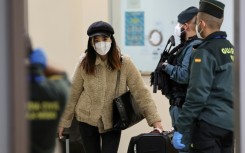 Passengers on the Air China CA 907 flight to Spain had to undergo a series of health controls after rules were imposed on visitors from China