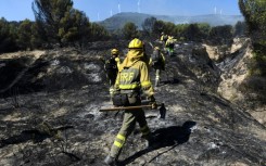 Firefighters put out a wildfire in the Moncayo Natural Park in the northern region of Aragon on August 15 last year.  