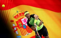 Rafael Nadal warms up before losing to Alex De Minaur in the United Cup team event