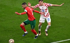 Morocco star Hakim Ziyech (L) playing against Croatia in the World Cup third-place playoff in Qatar on December 17, 2022.