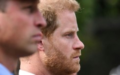 The feud between brothers Britain's Princes William (L) and Harry continues in the run-up to their father King Charles' coronation in May 2023