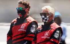 Mario Andretti and his son Michael stand on the grid prior to the 104th running of the Indianapolis 500 at Indianapolis Motor Speedway in August 2020