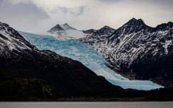 A glacier stretches over the Darwin Mountain Range in the Magallanes region of southern Chile, seen in September 2022