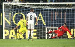 Villarreal's Spanish forward Gerard Moreno beats Thibaut Courtois from the penalty spot