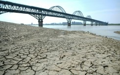 Commercial traffic along rivers in Europe and China -- as in this photo of the Yangtze River -- were disrupted by drought in 2022