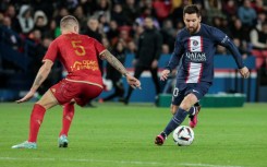 Lionel Messi (R) in action for PSG in their victory over Angers in Ligue 1 on Wednesday, his first appearance since winning the World Cup