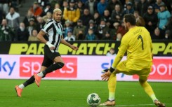 Key man: Joelinton (L) scores Newcastle's second goal in a 2-0 League Cup quarter-final win at home to Leicester 