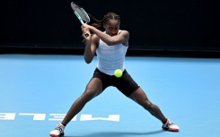 Coco Gauff of the US hits a return during a practice session ahead of the Australian Open tennis tournament in Melbourne