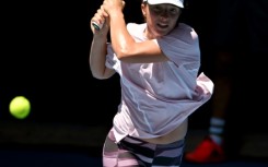 Poland's Iga Swiatek hits a return ahead of the Australian Open 