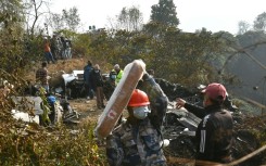 As light faded late Sunday, soldiers extracted bodies with ropes and stretchers out of the 300-metre-deep (1,000-foot) ravine