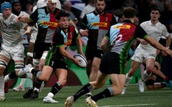 On the break: Harlequins fly-half Marcus Smith launches a break in Sunday's  game against Racing 92