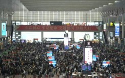 China: Passengers throng railway station as new year migration begins