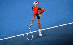 Russia's Daniil Medvedev serves to Australia's John Millman during the Australian Open