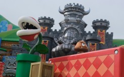 Mechanical Yoshis, Piranha Plants and Goombas from the beloved Super Mario gaming franchise greet visitors at Super Nintendo World