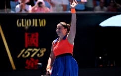 Jelena Ostapenko celebrates victory against Coco Gauff