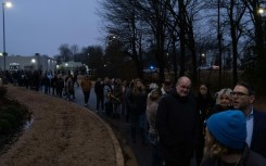 Hundreds of fans wait to enter Graceland, the estate of Elvis Presley, ahead of a memorial service for his daughter Lisa Maria Presley on January 22, 2023 in Memphis, Tennessee