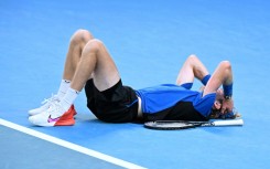 Russia's Andrey Rublev celebrates after victory against Denmark's Holger Rune