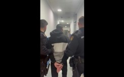 Suspect behind Spain deadly blade attack escorted by police