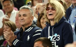 Novak Djokovic's father Srdjan Djokovic (L) has come under fire for posing with supporters of Russia's invasion of Ukraine