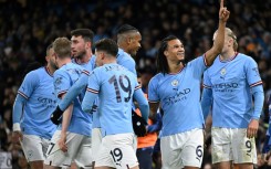 Match winner: Nathan Ake (2nd right) celebrates scoring as Manchester City beat Arsenal in the FA Cup