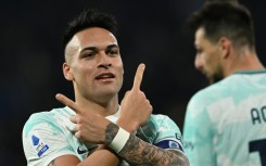 Fighting back: Inter Milan's Lautaro Martinez celebrates his two goals which took his league tally for the season to 11