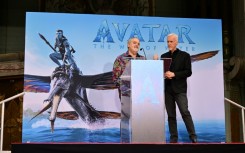 Director James Cameron (R), seen here at a January 12, 2023 Hollywood event with producer Jon Landau, now has three of the four all-time top grossing films: the original "Avatar," its new sequel and "Titanic" 