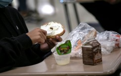 File: A person eating lunch. AFP/Getty Images/John Moore