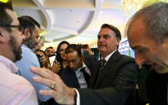 'I've always been a huge admirer of the American people,' Jair Bolsonaro tells a rally in Florida