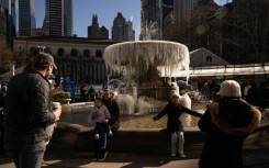 A fountain in New York's Bryant Park is frozen over on February 4, 2023