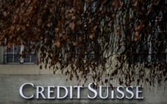 Scandal-plagued Credit Suisse reported a net loss of 7.3 billion Swiss francs ($7.9 billion) for 2022