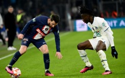 Lionel Messi (L) in action for PSG against Marseille in the French Cup on Wednesday