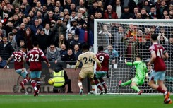 West Ham defender Emerson (L) scores the equalising goal against Chelsea