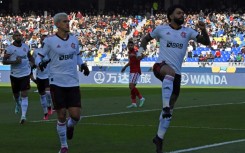 Flamengo's Brazilian forward Gabriel Barbosa (R) celebrates scoring his team's opening goal against Al Ahly