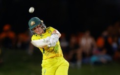 Hitting out: Australia's Alyssa Healy hits a boundary against New Zealand
