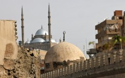 Cairo's iconic domes and minarets are embedded into the labyrinthine alleys of tight-knit working-class neighbourhoods